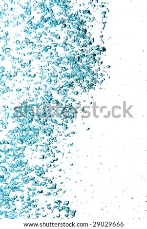 Blue efffervescent bubbles of fresh sparkling water with space for text