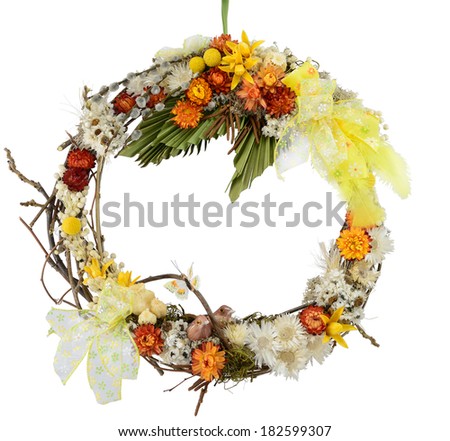 Spring wreath with flowers, bird and butterfly isolated on white.