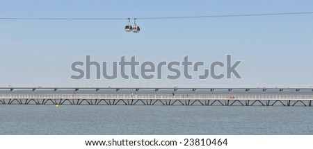 Cable car, Bridge Vasco da Gama and footbridge in Lisbon at Expo area.