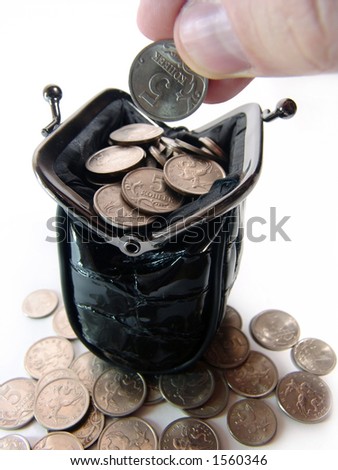 A photo of black women coin purse full of coins