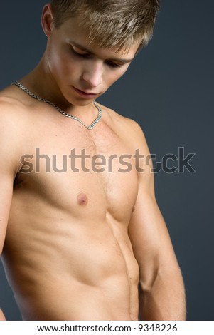 stock-photo-handsome-young-man-with-athl