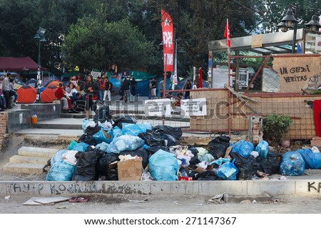 ISTANBUL - JUNE 10 2013 : People living in Gezi Park decent way. Collecting trash and cleaning