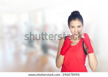 portrait of young beautiful woman 20 - 30 year old during fitness time and exercising in gym