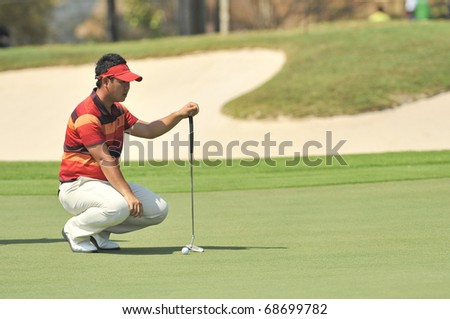 HUA HIN THAILAND - JANUARY 9 : Shunsuke Sonoda action in The Royal Trophy Tournament at Black Mountain Golf Club Hua Hin Thailand on January 9 2011.