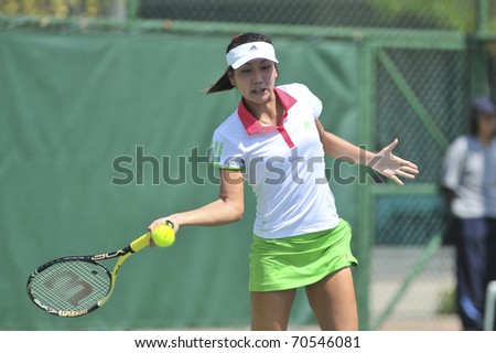 NONTHABURI ,THAILAND - FEB 4 : Chinese Taipel tennis player Ting Fei Juan during her Fed Cup, 2011 World Group Play-Off singles match vs. JunriNamigata ,February 4, 2011 in Nonthaburi ,Thailand