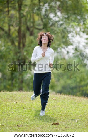 Beautiful Woman doing Fitness and Yoga