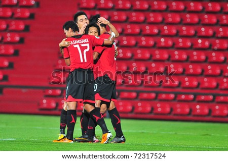 BANGKOK THAILAND - MAR 2: Unidentified players in action during AFC Cup match between Muang Thong utd.(THA) vs Hanoi T&T (VIE) on March 2, 2011 in Thunderdome Stadium Bangkok, Thailand
