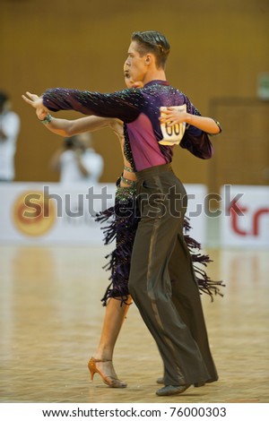 BANGKOK - APR 24 : Unidentified couple dance during TDSA/IDSF Open (Standard & Latin) Dance Sport Championship 2011 on April 24, 2011 in Bangkok, Thailand.