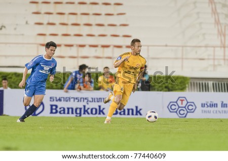 BANGKOK - MAY 17: H.Nakata (Y) in action during Thailand-Japan Stars Charity Match between Stars Thailand (B) vs Stars Japan (Y) on May 17, 2011 at Supachalasia Stadium Bangkok,Thailand.