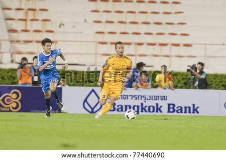 BANGKOK - MAY 17: H.Nakata (Y) in action during Thailand-Japan Stars Charity Match between Stars Thailand (B) vs Stars Japan (Y) on May 17, 2011 at Supachalasia Stadium Bangkok,Thailand.