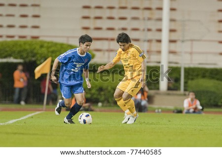 BANGKOK - MAY 17: T.Bunmathan in action during Thailand-Japan Stars Charity Match between Stars Thailand (B) vs Stars Japan (Y) on May 17, 2011 at Supachalasia Stadium Bangkok,Thailand.