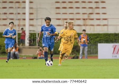 BANGKOK - MAY 17: T.Sripan in action during Thailand-Japan Stars Charity Match between Stars Thailand (B) vs Stars Japan (Y) on May 17, 2011 at Supachalasia Stadium Bangkok,Thailand.
