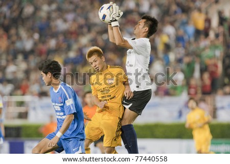 BANGKOK - MAY 17:P.Tanganurat (R) in action during Thailand-Japan Stars Charity Match between Stars Thailand (B) vs Stars Japan (Y) on May 17, 2011 at Supachalasia Stadium Bangkok,Thailand.