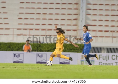 BANGKOK - MAY 17: E.Davids (Y) in action during Thailand-Japan Stars Charity Match between Stars Thailand (B) vs Stars Japan (Y) on May 17, 2011 at Supachalasia Stadium Bangkok,Thailand.