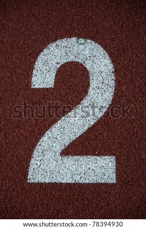 Number 2 on the start of a running track - check my portfolio for other numbers