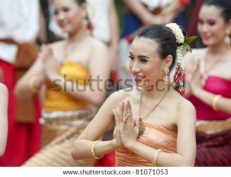 Portrait of a Thai woman.: Thai traditional dance. This is the parade of making traditional merit of people from the northern territory of Thailand
