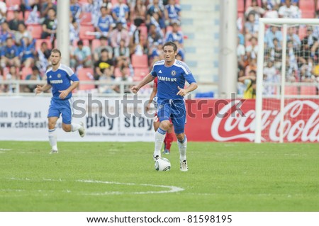 BANGKOK - JULY 24 : F.Lampard (B) in action during Coke Super Cup :Chelsea Asia Tour 2011 Thailand .Rajamangla Stadium ,July 24, 2011 in Bangkok, Thailand.