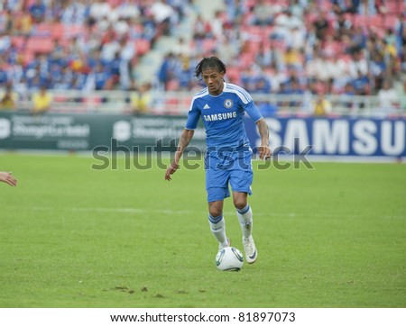 BANGKOK - JULY 24 : P.Aanholt (B) in action during Coke Super Cup : Chelsea  Asia Tour 2011 (Thailand),  between Chelsea vs Thail  All-Star on July 24, 2011 in Rajamangla Stadium, Bangkok, Thailand.