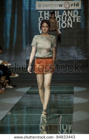 BANGKOK, THAILAND - SEPTEMBER 16 : Model showcases on the catwalk during Thailand Graduate Fashion Week 2011 ( TGFW )on September 16, 2011 in Bangkok Thailand.