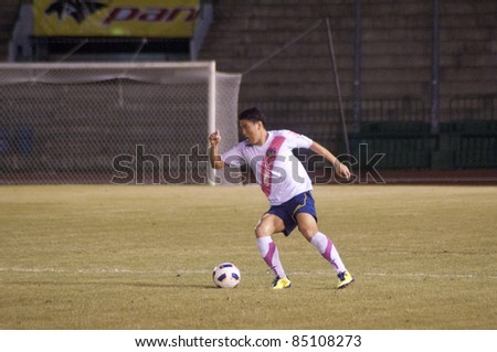 BANGKOK, THAILAND - SEPTEMBER 21 : K.Chae (R) in action during Thai Premier League ( Divition 1) between BBCU Fc (P) vs Chainat fc (W) on September 21, 2011 at Army Stadium in Bangkok Thailand