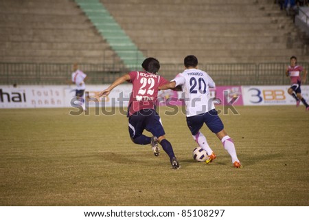 BANGKOK, THAILAND - SEPTEMBER 21 : P.Suwanchat (R) in action during Thai Premier League ( Divition 1) between BBCU Fc (P) vs Chainat fc (W) on September 21, 2011 at Army Stadium in Bangkok Thailand