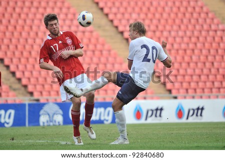 BANGKOK THAILAND - JANUARY 15 : A.Soderlund (R) in action during KING\'S CUP 2012 between Denmark vs Norway on January 15, 2012 in Rajamangla Stadium,Bangkok, Thailand.