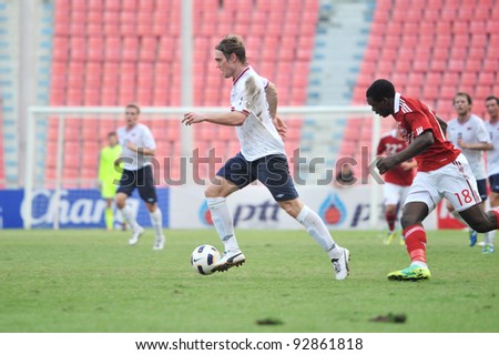BANGKOK THAILAND - JANUARY 15 : T.Sorum (L) in action during KING\'S CUP 2012 between Denmark vs Norway on January 15, 2012 in Rajamangla Stadium,Bangkok, Thailand.