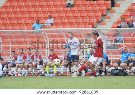 BANGKOK THAILAND - JANUARY 15 : P.Jakob (R) in action during KING\'S CUP 2012 between Denmark vs Norway on January 15, 2012 in Rajamangla Stadium,Bangkok, Thailand.
