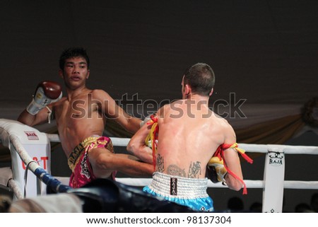 BANGKOK, THAILAND- MARCH 16 : Unidentified athletes compete in World Amateur Muaythai Champioships 2012. on March 16, 2012 at National Stadium, Bangkok, Thailand