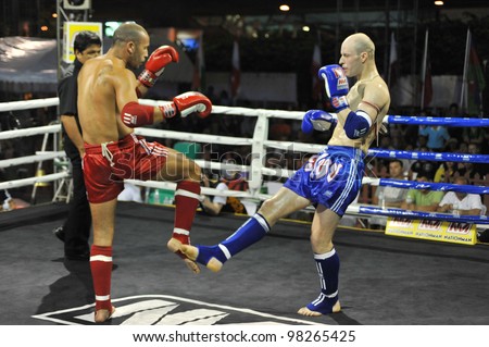 BANGKOK, THAILAND- MARCH 22 : Abduvakhob Sharipov (red) VS Ritsihard Jocr (Blue) in World Amateur Muaythai Champioships 2012. on March 22, 2012 at National Stadium, Bangkok, Thailand