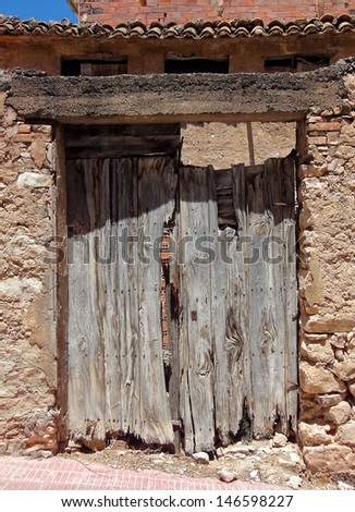 first plane of a wooden door, in an old town house
