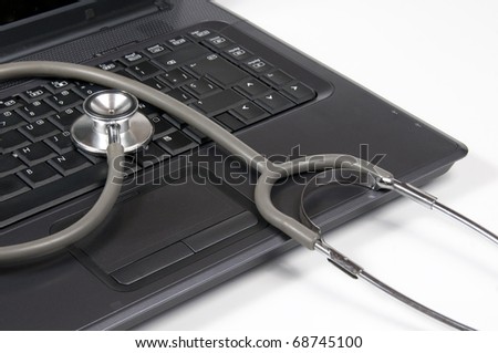 picture of portable computer and stethoscope