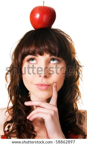 stock photo Portrait of a cute brunette with an apple on her head white