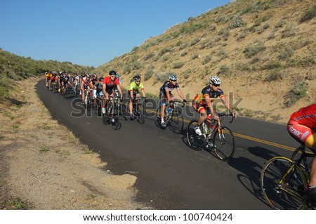 BAKERSFIELD, CA - APR 21: Men contestants ride the ninety mile mountainous route of the  Vlees Huis Professional  Road Race on April 21, 2012, in Bakersfield, California.
