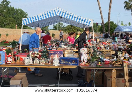 BAKERSFIELD, CA - MAY 4: Many people turn out to eye merchandise and shop for bargains at the \