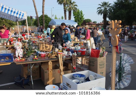 BAKERSFIELD, CA - MAY 4: Many people turn out to eye merchandise and shop for bargains at the \