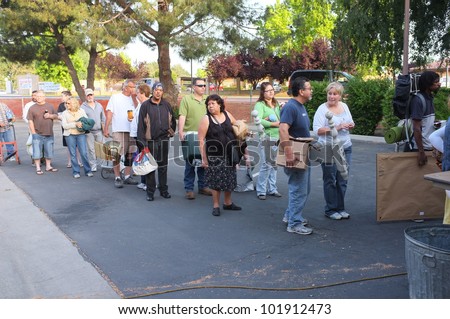 BAKERSFIELD, CA - MAY 4: People line up to pay for their merchandise at the \