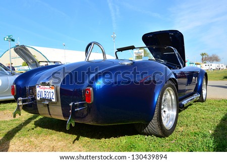 BAKERSFIELD, CA-MAR 2: This rare Shelby Cobra is a big hit at the Cruisin\' For A Wish Car & Motorcycle Show on March 2, 2013, in Bakersfield, California.