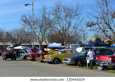 BAKERSFIELD, CA-MAR 2: Old friends meet and car fanciers are treated to exotic car displays at the Cruisin\' For A Wish Car & Motorcycle Show on March 2, 2013, in Bakersfield, California.