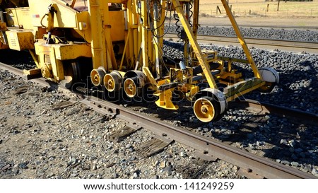 Typical of railroad work equipment is this switch production tamper with heavy duty workhead