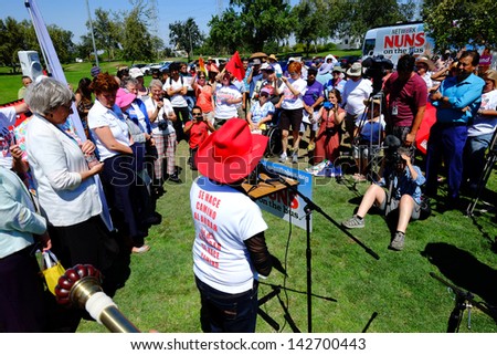 BAKERSFIELD, CA-JUN 15: Dolores Huerta inspires the crowd before the march to Congressman Kevin McCarthy\'s office in support of a new immigration law on June 15, 2013, in Bakersfield, California.
