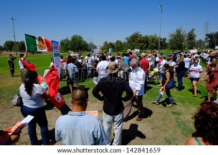 BAKERSFIELD, CA - JUN 15: Activists gather prior to a march, hoping to influence Rep. Kevin McCarthy to back a new immigration law on June 15, 2013, in Bakersfield, California.