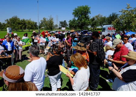 BAKERSFIELD, CA - JUN 15: Activists gather prior to a march, hoping to influence Rep. Kevin McCarthy to back a new immigration law on June 15, 2013, in Bakersfield, California.