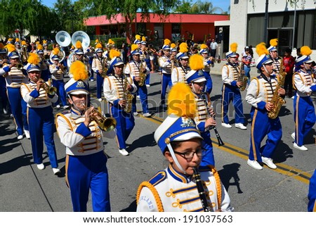 SHAFTER, CA - MAY 3, 2014: The Richland High School band excites the spectators with their music and precision marching during the Cinco de Mayo Celebration parade.