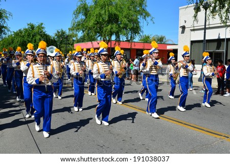 SHAFTER, CA - MAY 3, 2014: The Richland High School band excites the spectators with their music and precision marching during the Cinco de Mayo Celebration parade.