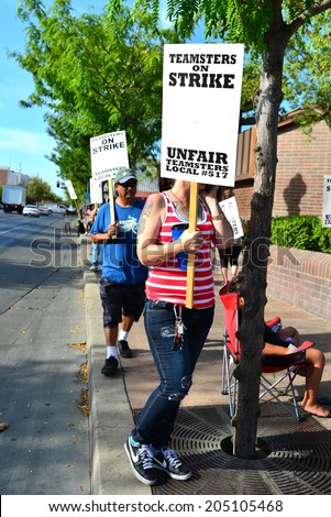 BAKERSFIELD, CA-JULY 15, 2014: After six months failed negotiations the teamsters union strikes the Golden Empire Transit District. Today is the first day of the picket line.