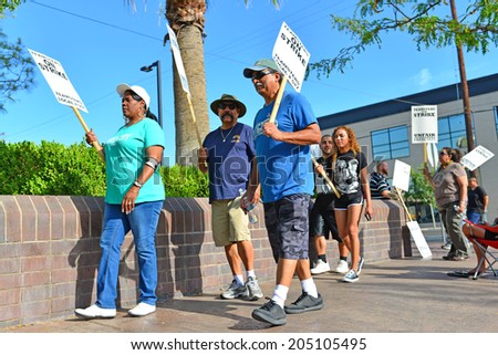 BAKERSFIELD, CA-JULY 15, 2014: After six months failed negotiations the teamsters union strikes the Golden Empire Transit District. Today is the first day of the picket line.