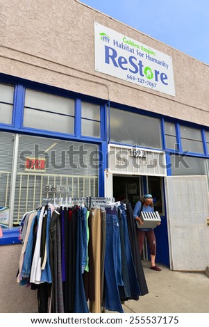 BAKERSFIELD, CA - FEBRUARY 20. 2015: The Habitat for Humanity's retail store moves merchandise outside in order to attract customers.