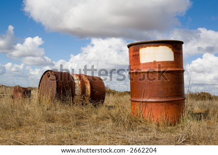 Old abandoned fifty five gallon drums held toxic chemicals