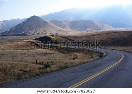 Secondary road snakes its way through foothills and into the Southern Sierra Range, California